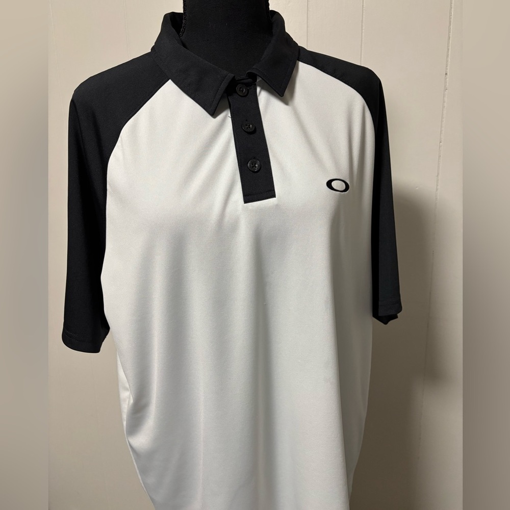 White and black Oakley golf polo